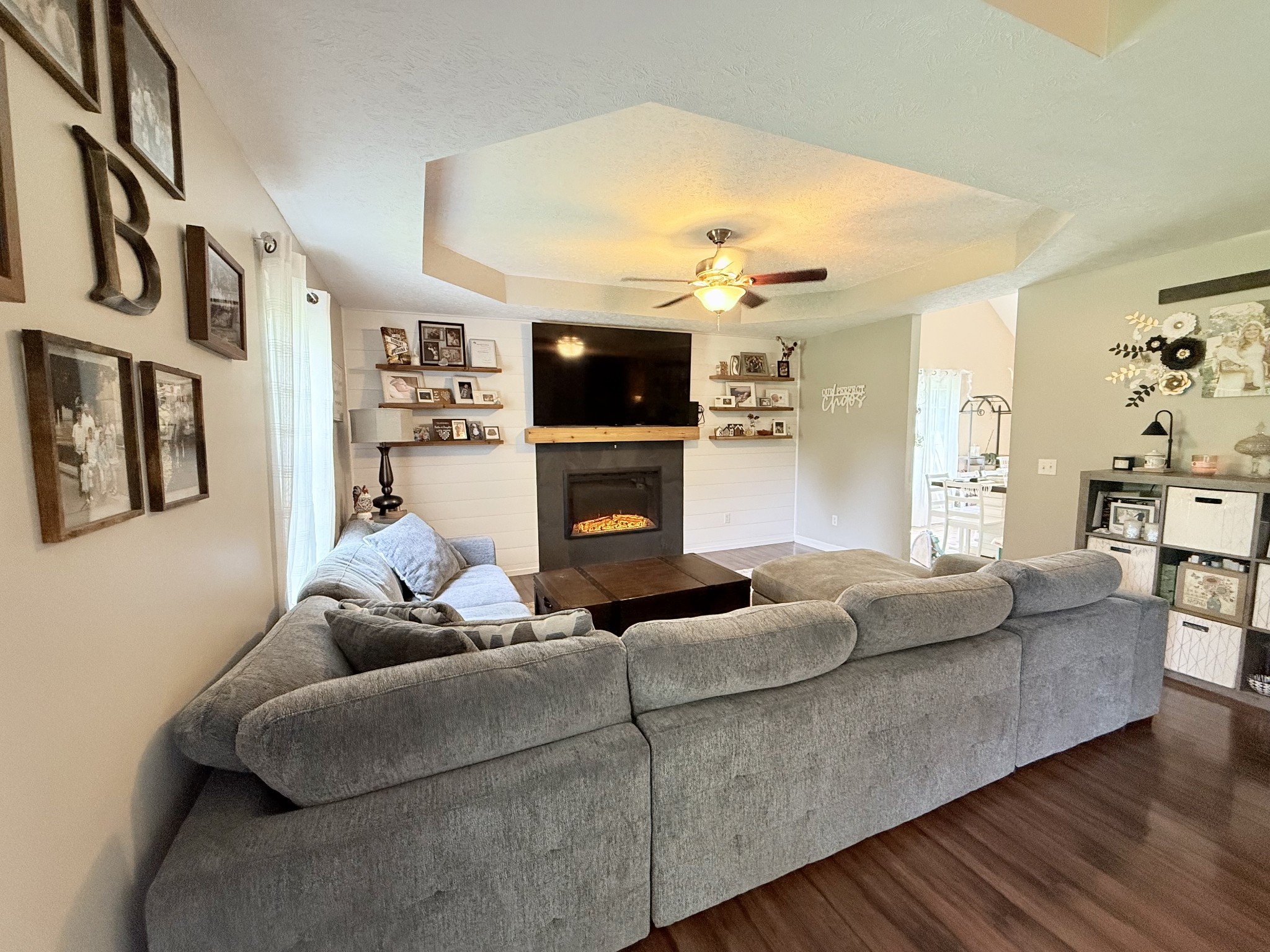 1479 Mt Vernon Road Bethpage, TN 37022 - Photo 3 of 39 a living room with furniture a flat screen tv and a fireplace