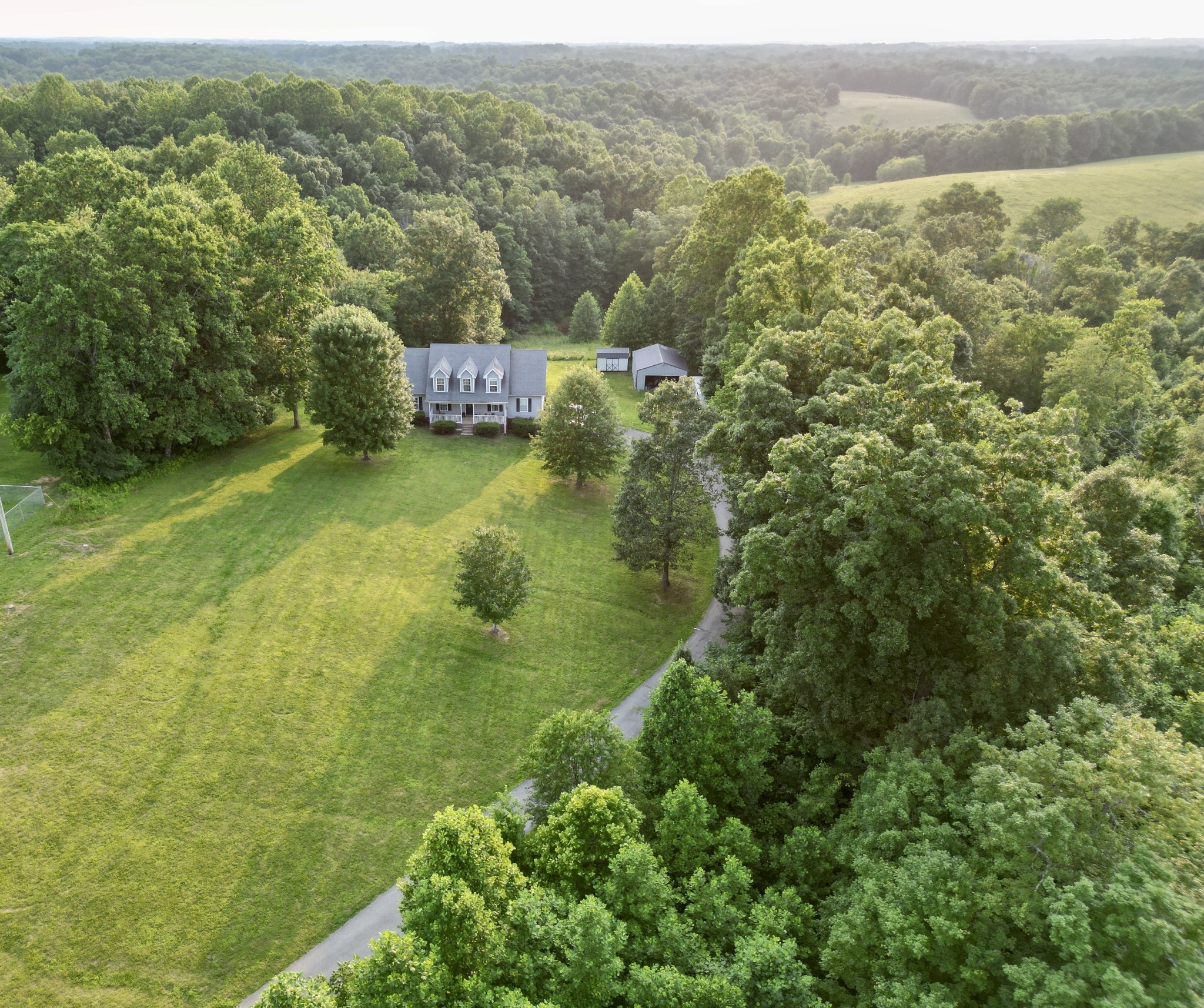 1479 Mt Vernon Road Bethpage, TN 37022 - Photo 36 of 39 an aerial view of residential houses with outdoor space and trees