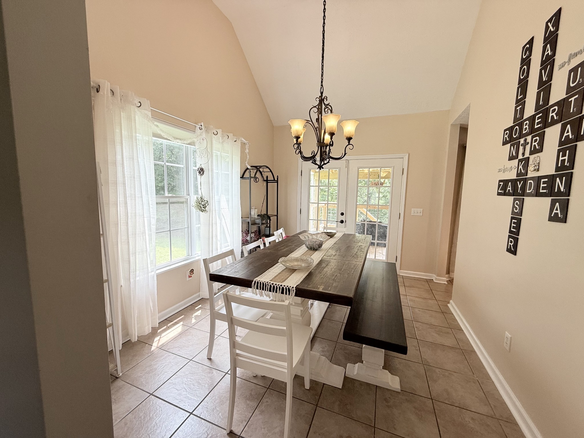 1479 Mt Vernon Road Bethpage, TN 37022 - Photo 8 of 39 a view of a dining room with furniture and chandelier