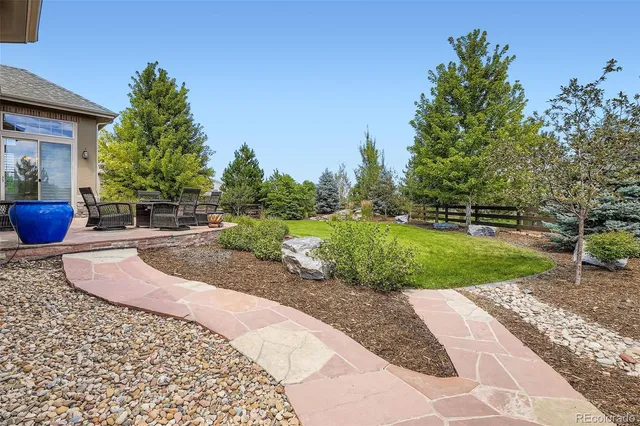 a garden view with a seating space