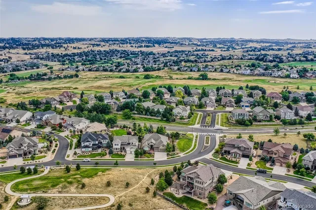a view of a street with a sign board