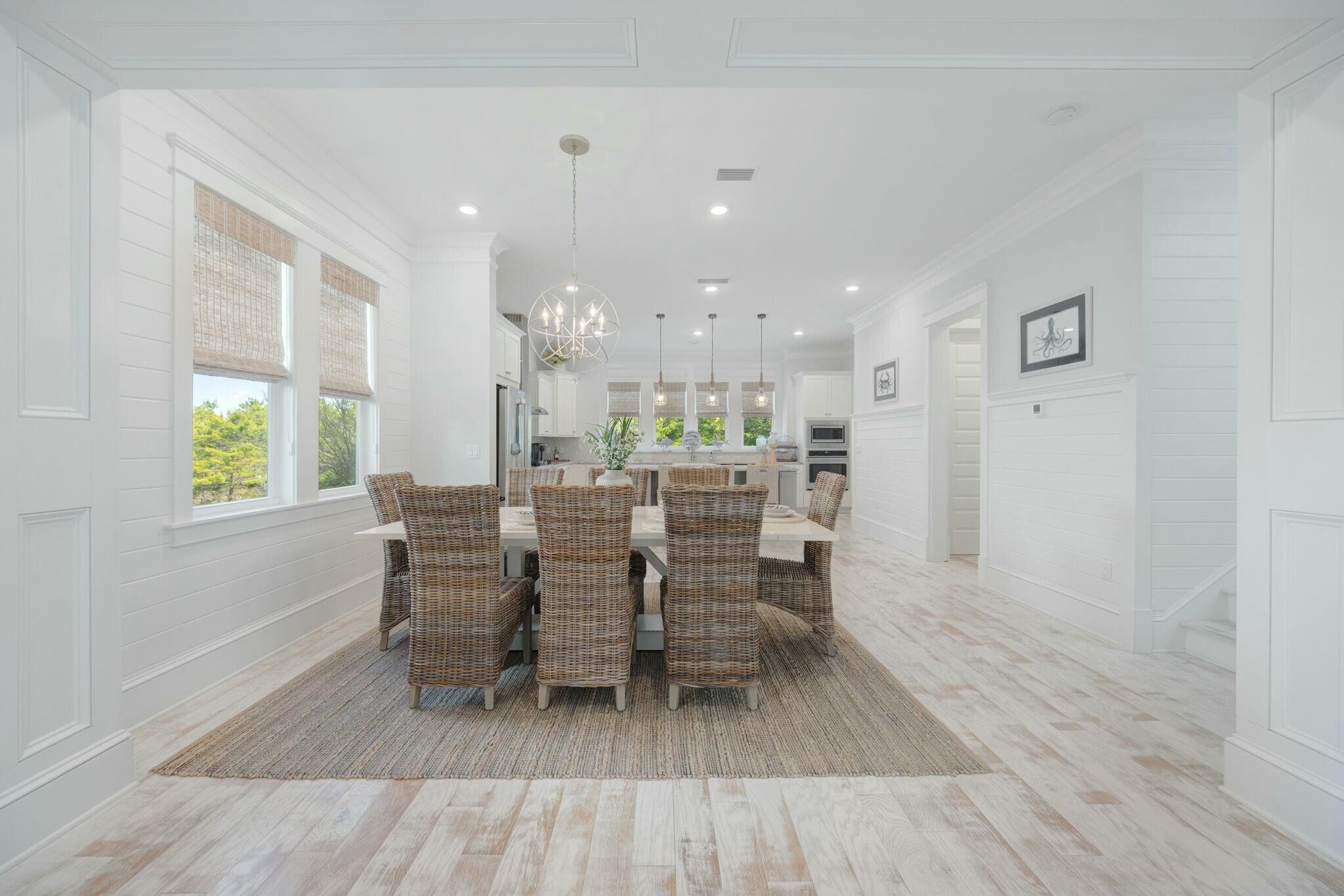 166 Clipper St Inlet Beach Inlet Beach, FL 32461 - Photo 21 of 71 a dining room with furniture and wooden floor