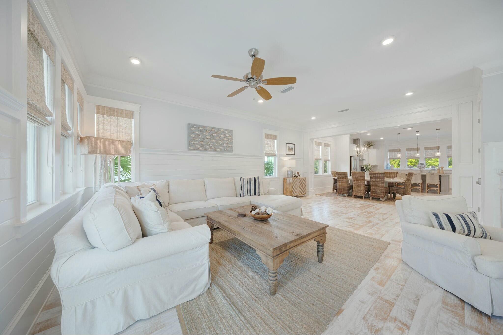 166 Clipper St Inlet Beach Inlet Beach, FL 32461 - Photo 25 of 71 a living room with furniture or couch and a chandelier