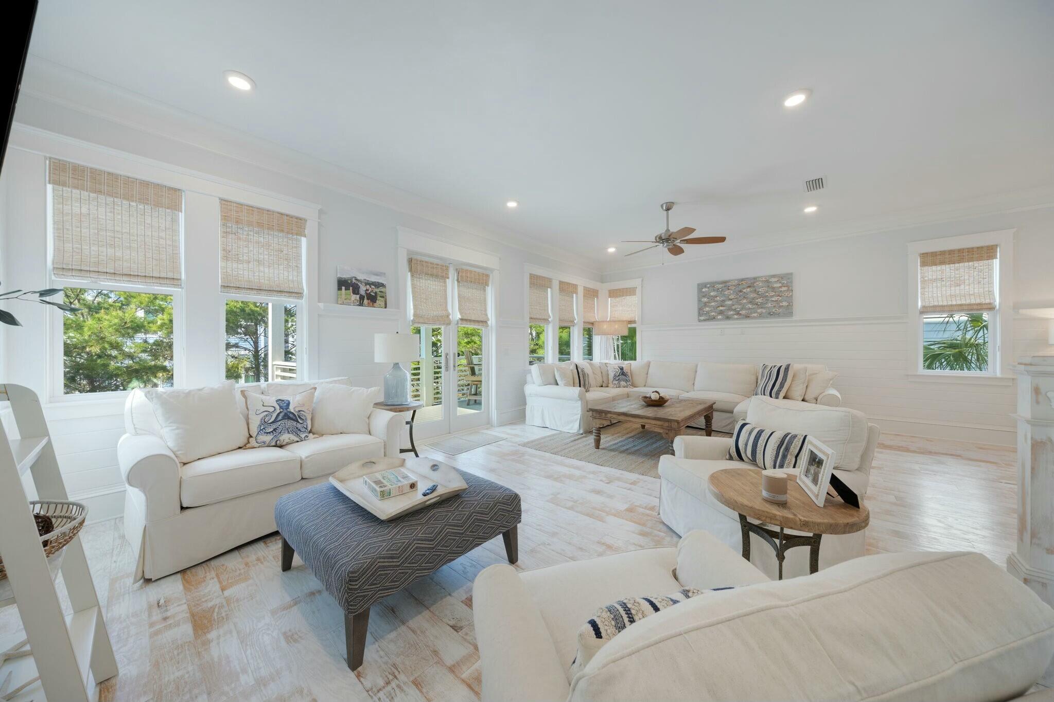 166 Clipper St Inlet Beach Inlet Beach, FL 32461 - Photo 26 of 71 a living room with furniture and a large window