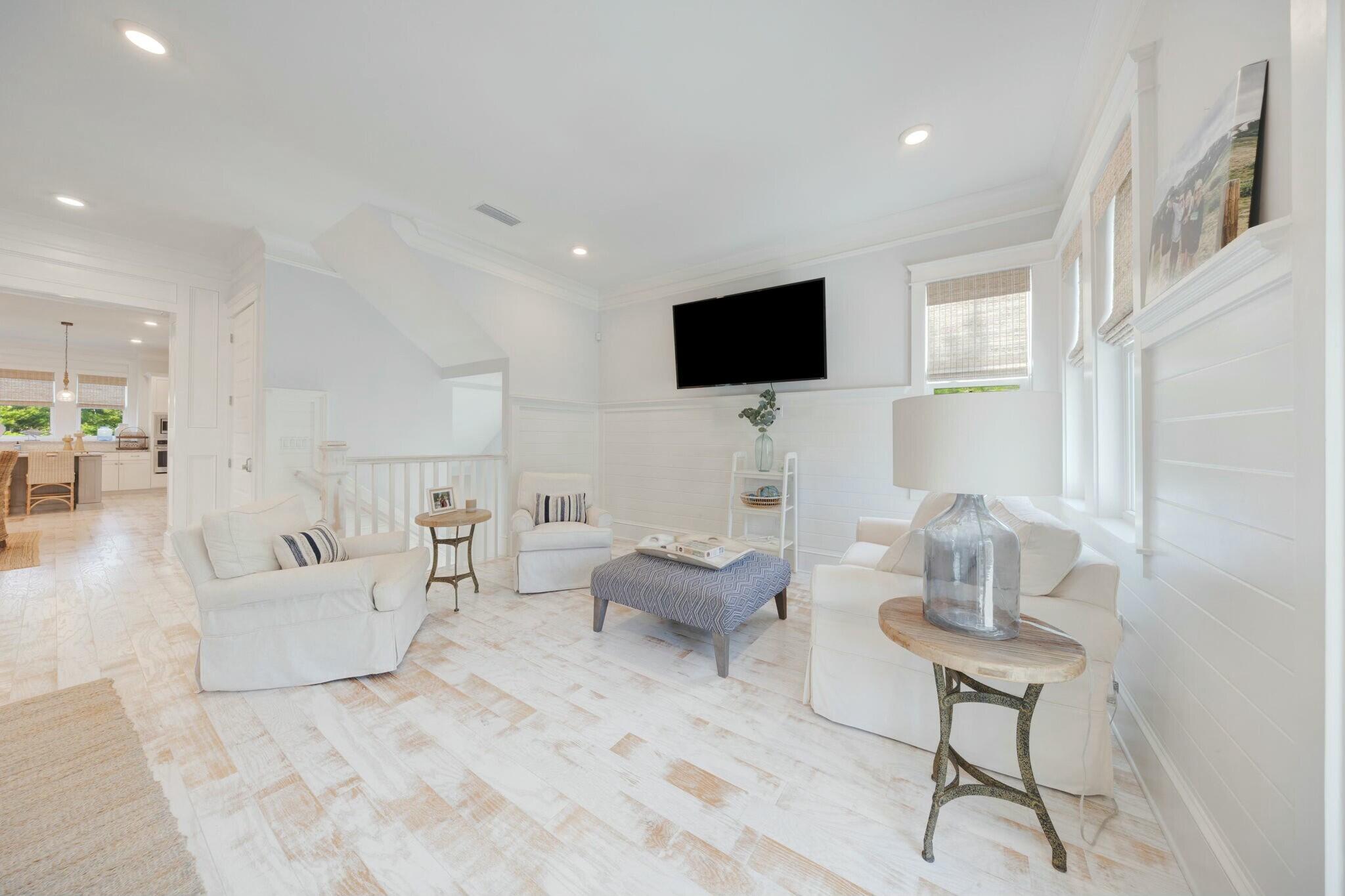 166 Clipper St Inlet Beach Inlet Beach, FL 32461 - Photo 27 of 71 a living room with furniture and a flat screen tv