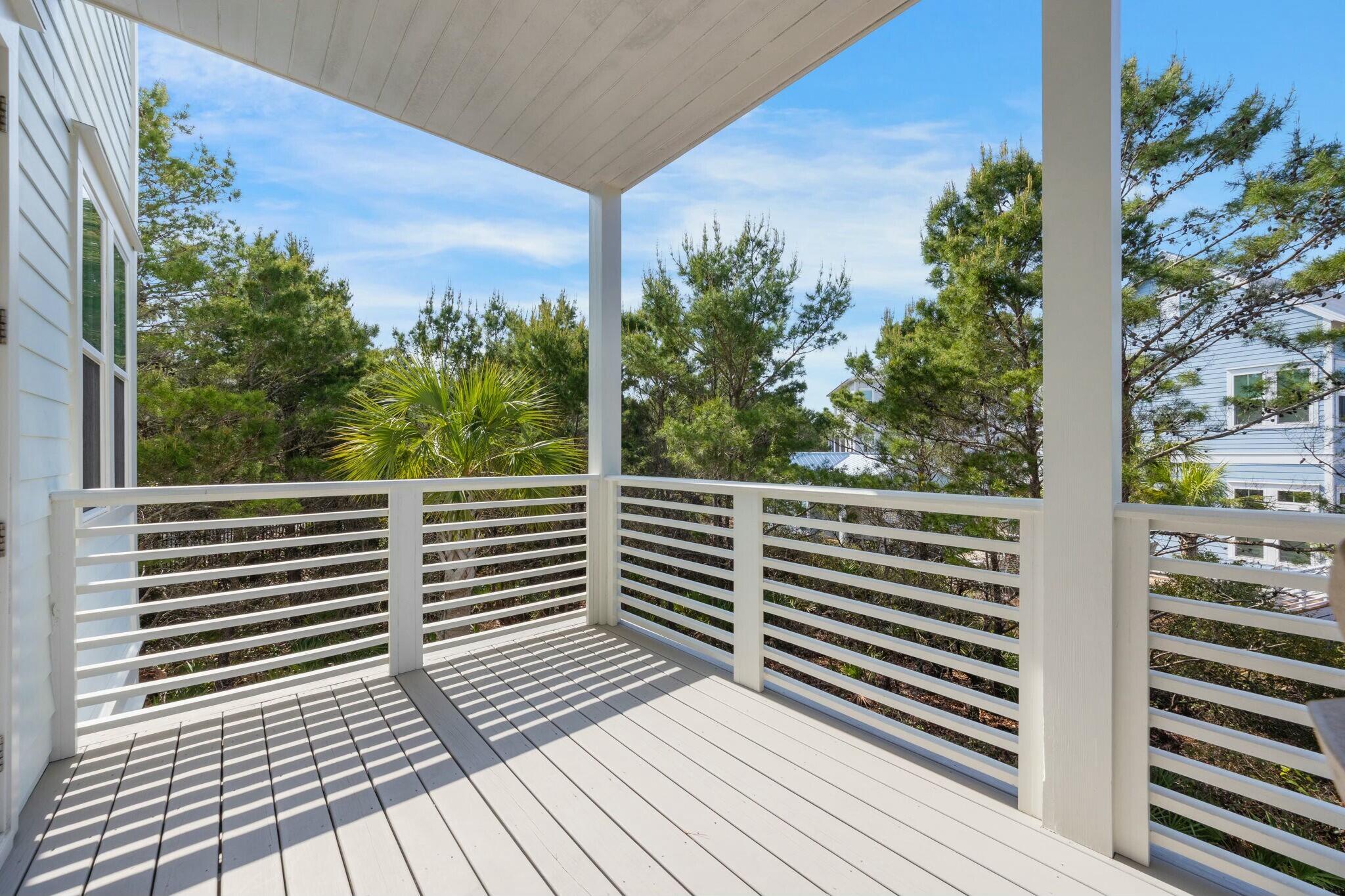 166 Clipper St Inlet Beach Inlet Beach, FL 32461 - Photo 29 of 71 a view of a balcony with plants