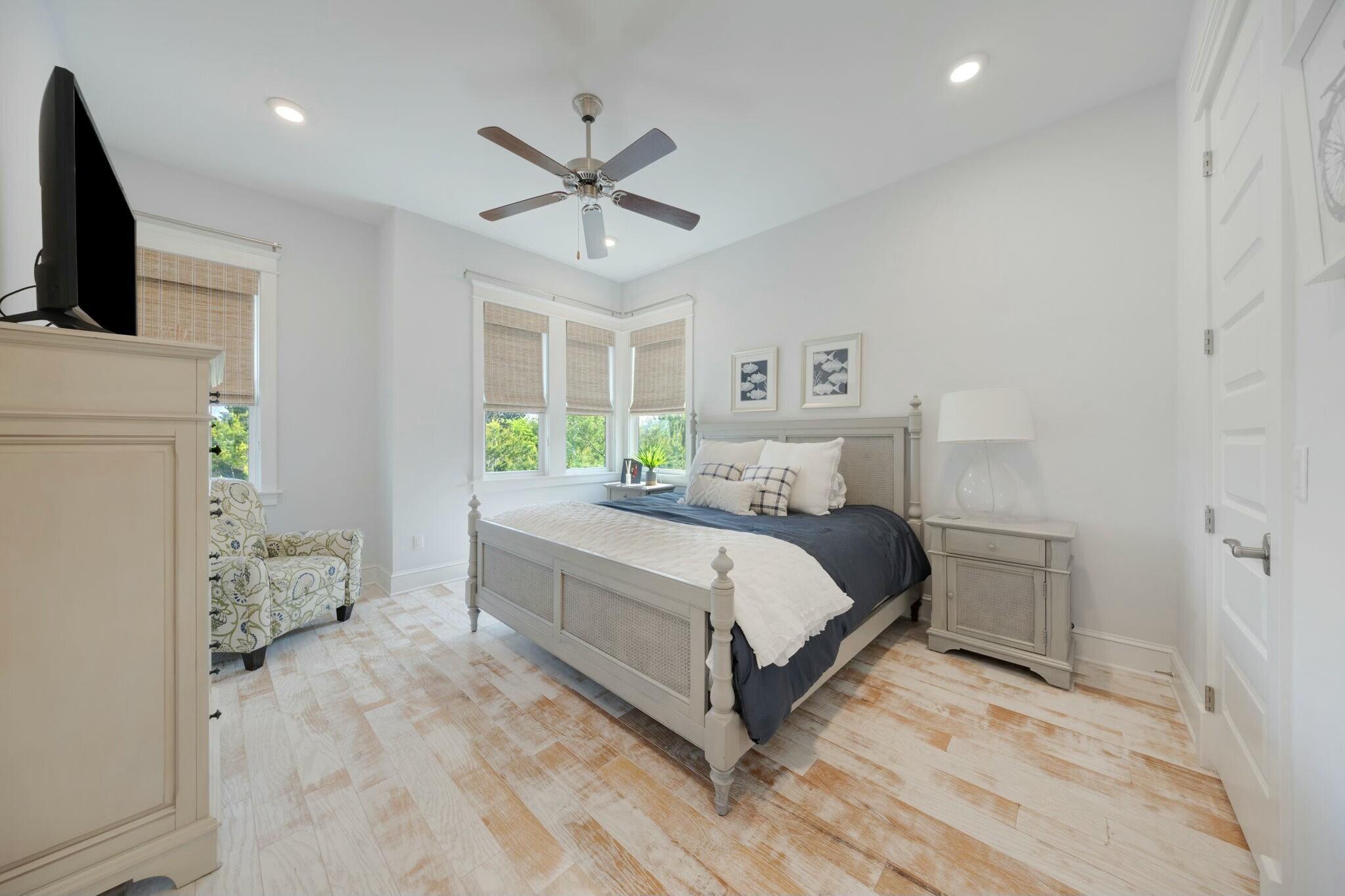 166 Clipper St Inlet Beach Inlet Beach, FL 32461 - Photo 36 of 71 a bedroom with a bed and a flat screen tv