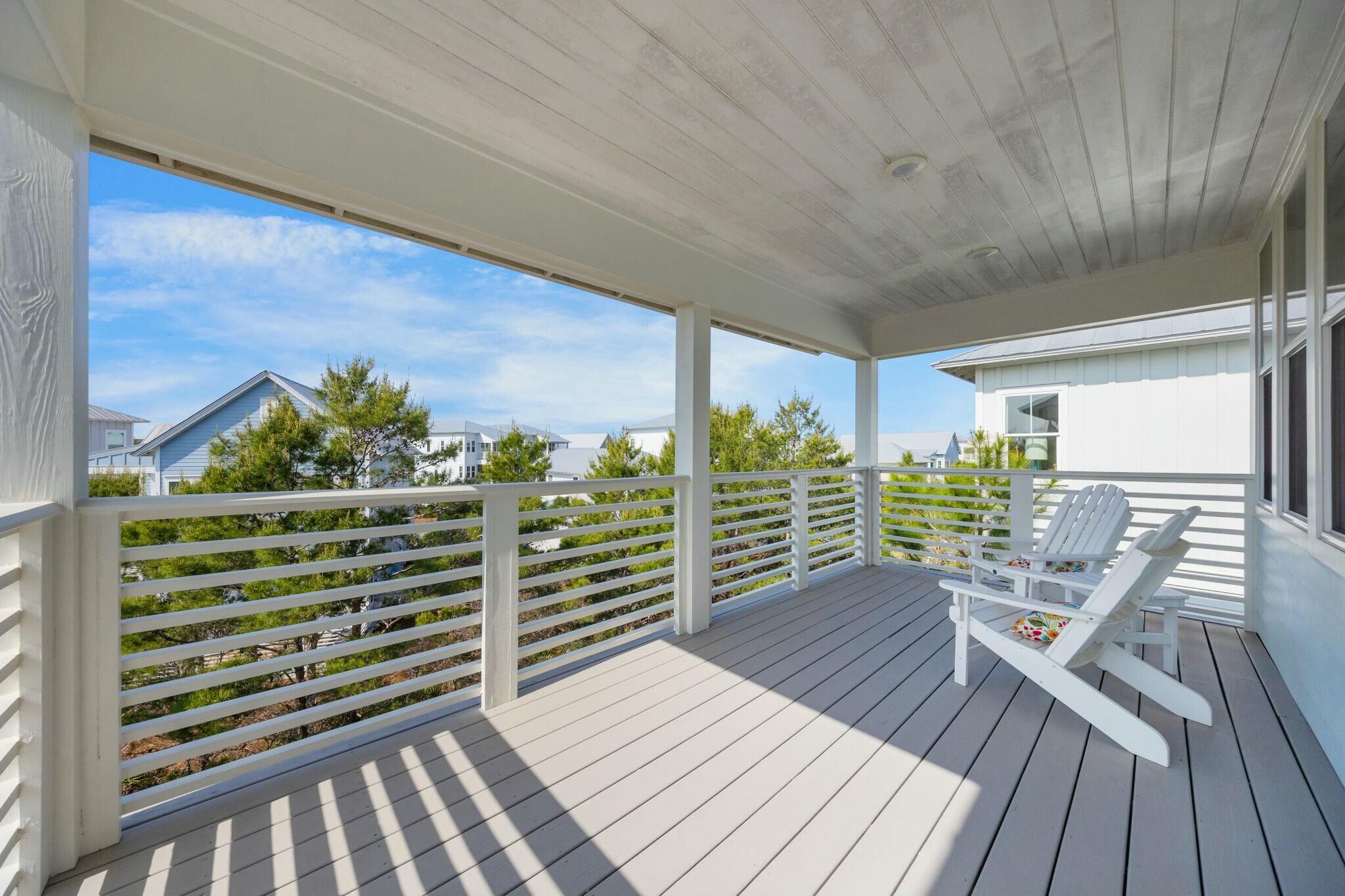 166 Clipper St Inlet Beach Inlet Beach, FL 32461 - Photo 40 of 71 a balcony with wooden floor and outdoor space