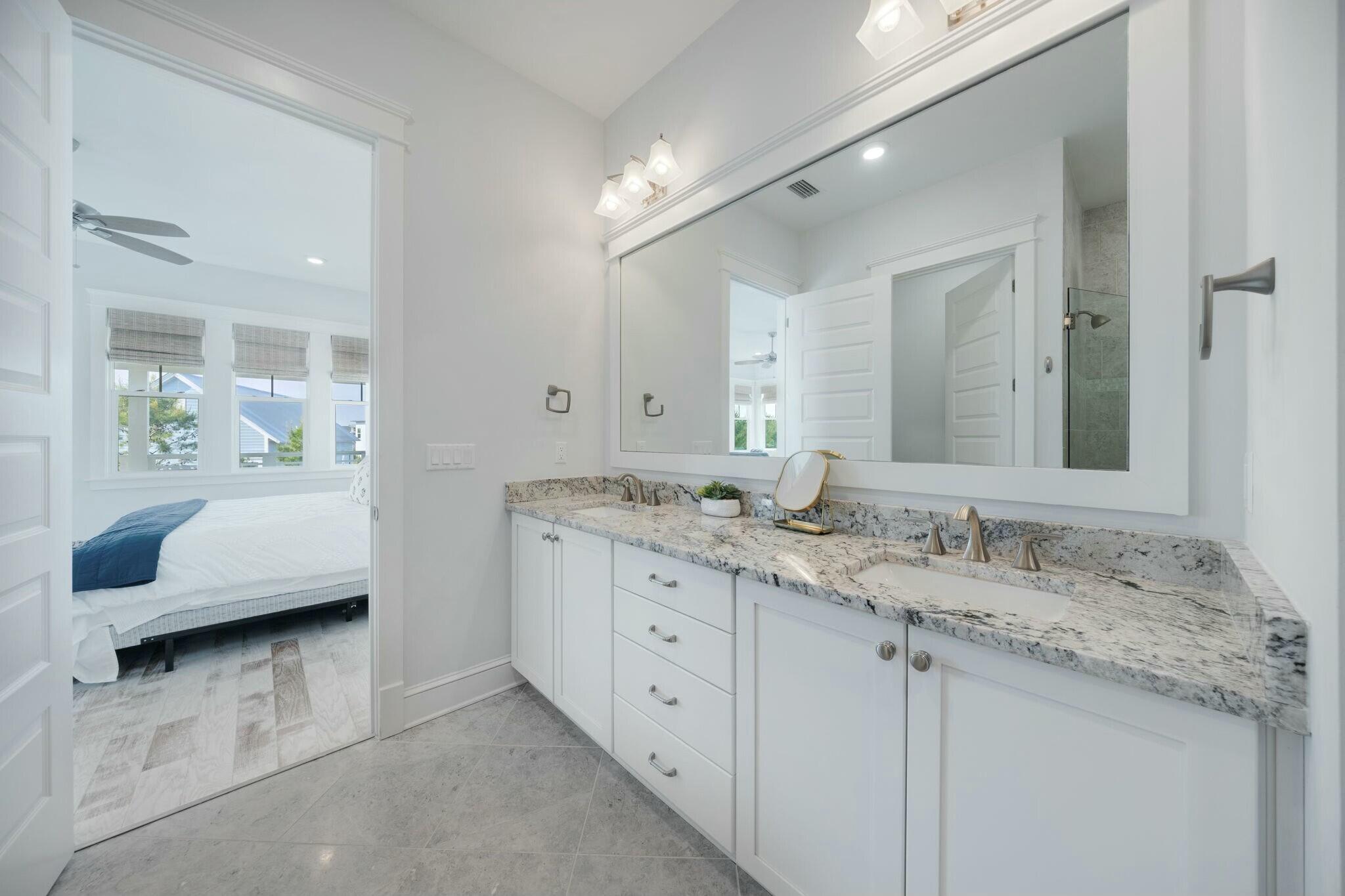 166 Clipper St Inlet Beach Inlet Beach, FL 32461 - Photo 41 of 71 a en suite bathroom with a granite countertop sink and a large mirror