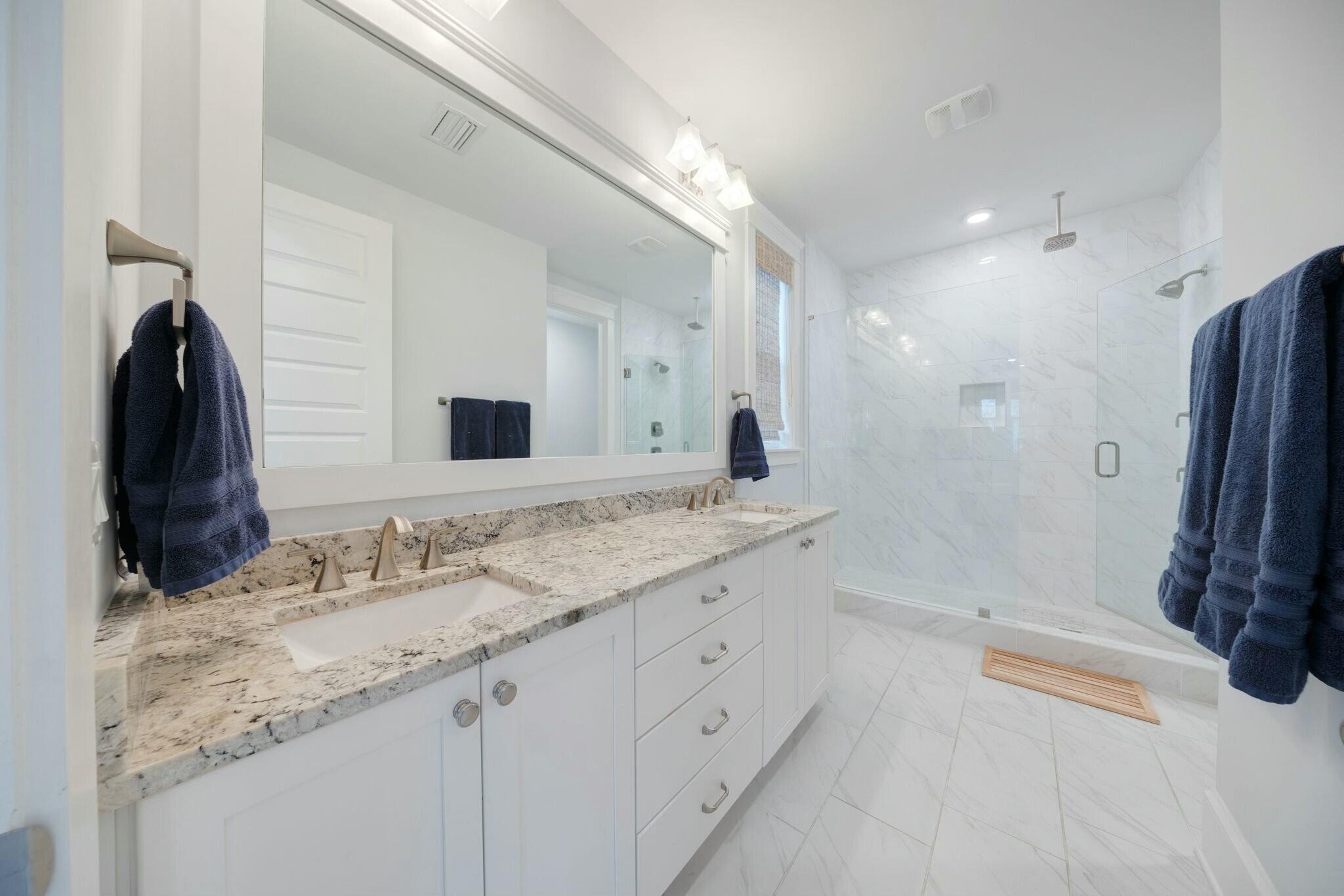 166 Clipper St Inlet Beach Inlet Beach, FL 32461 - Photo 48 of 71 a bathroom with a granite countertop sink a large mirror and a bathtub