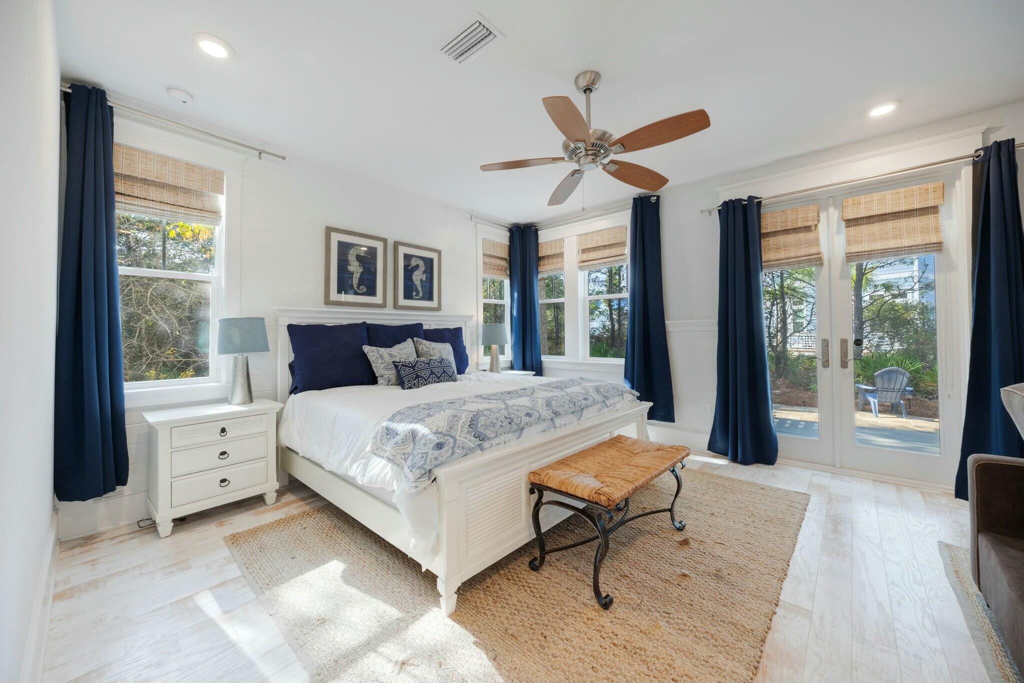 166 Clipper St Inlet Beach Inlet Beach, FL 32461 - Photo 53 of 71 a bedroom with a large bed and a large window