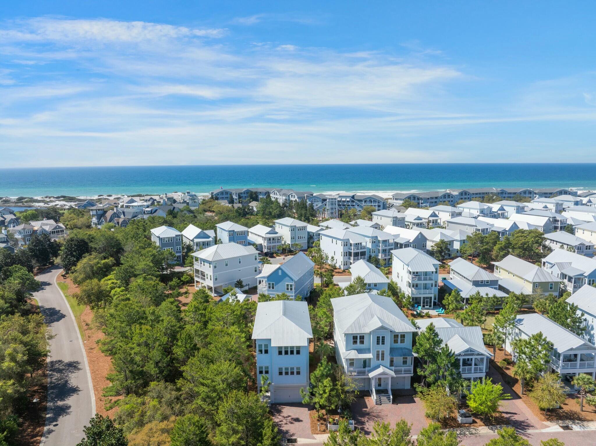 166 Clipper St Inlet Beach Inlet Beach, FL 32461 - Photo 71 of 71 an aerial view of residential building with parking space