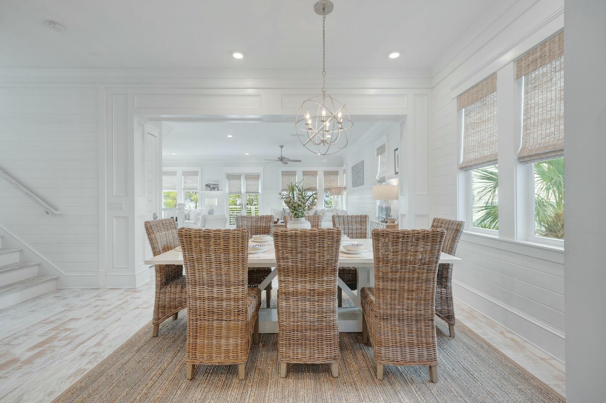 166 Clipper St Inlet Beach Inlet Beach, FL 32461 - Photo 9 of 71 a view of a dining room with furniture wooden floor and chandelier
