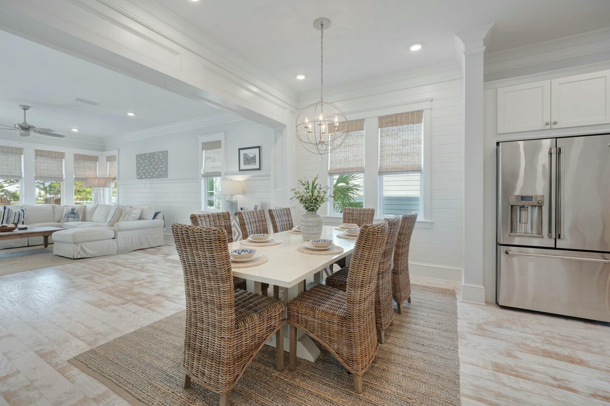 166 Clipper St Inlet Beach Inlet Beach, FL 32461 - Photo 10 of 71 a view of a dining room with furniture window and wooden floor