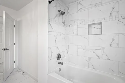 a bathroom with a bathtub