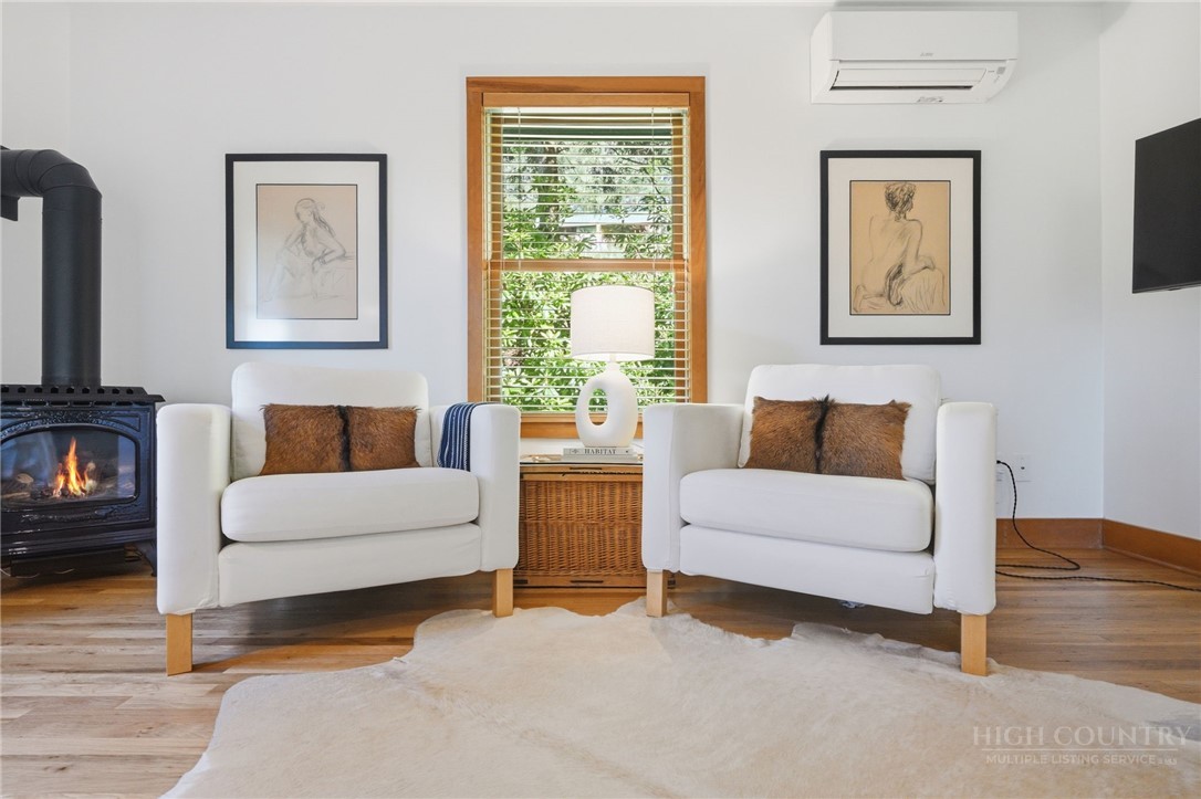 165 All Hallows Road Boone, NC 28607 - Photo 23 of 50 a living room with furniture and a window