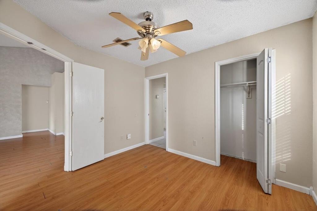 920 Danforth Place Arlington, TX 76017 - Photo 15 of 28 a view of an empty room with wooden floor