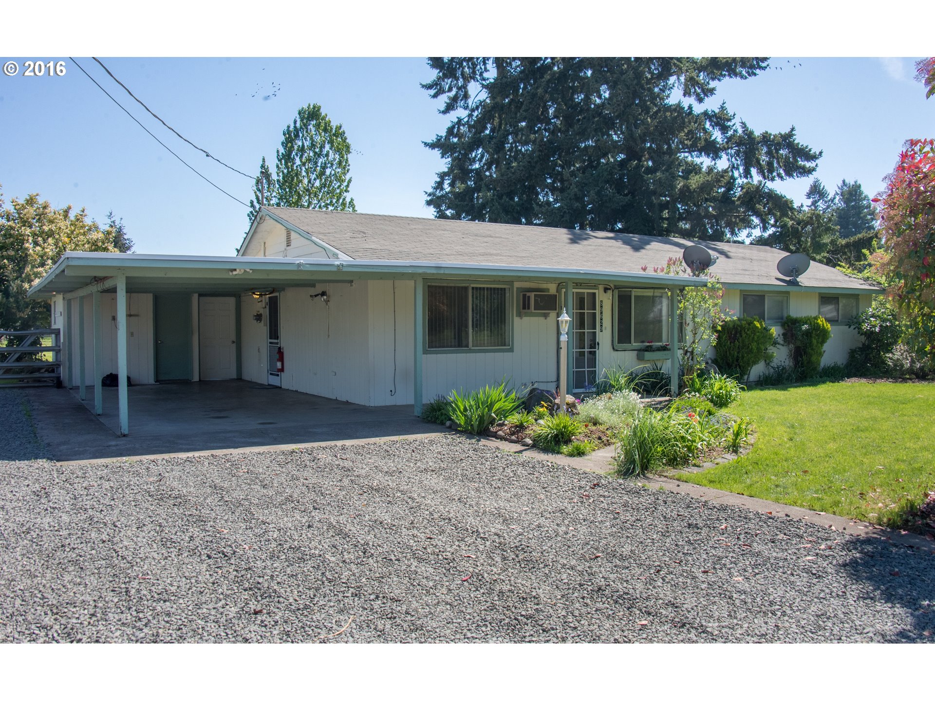 89629 Fir Butte Road Eugene, OR 97402 - Photo 1 of 1 a front view of a house with garden