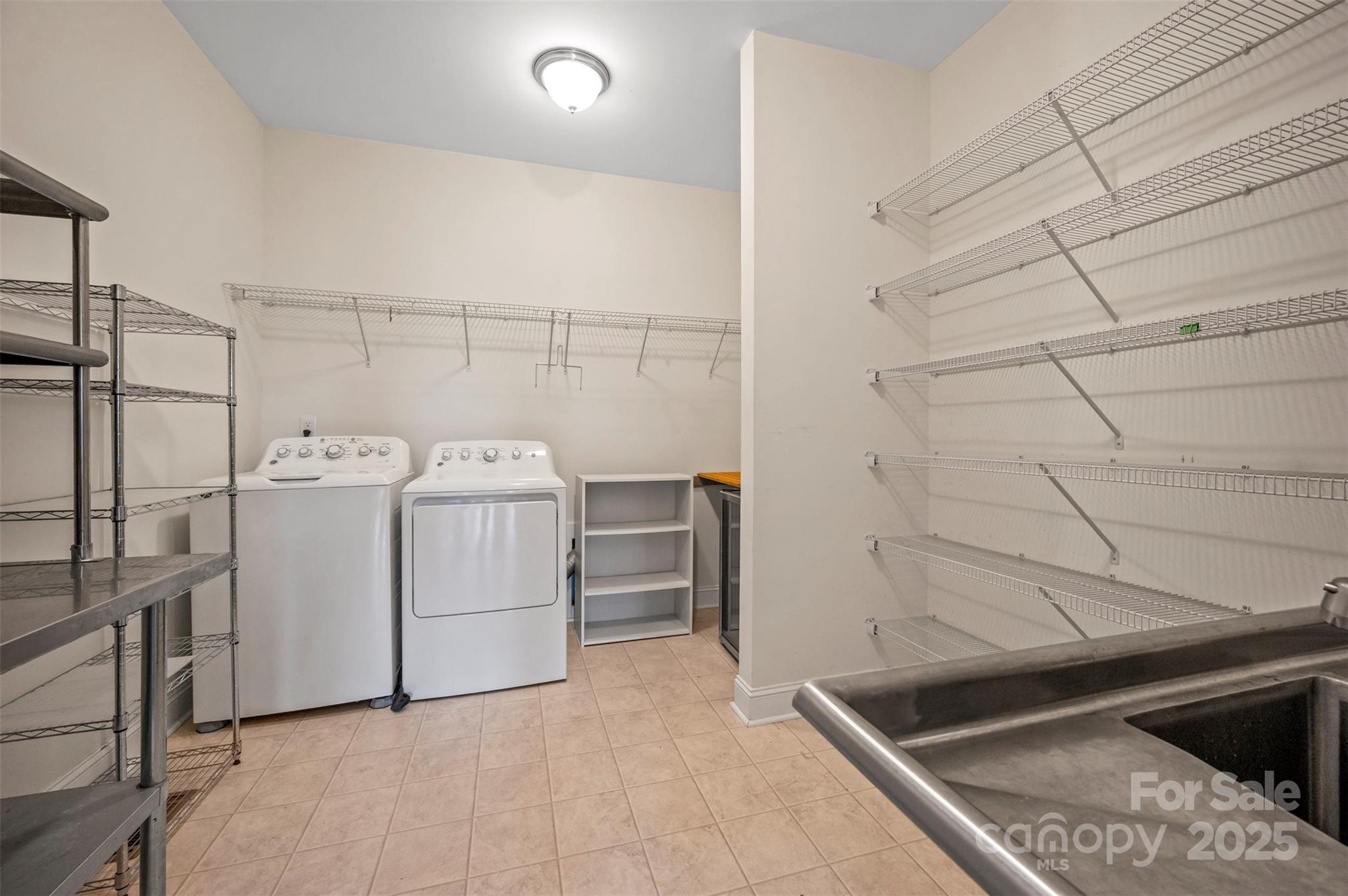 10105 Highway 108 Mill Spring, NC 28756 - Photo 15 of 44 a utility room with dryer and washer