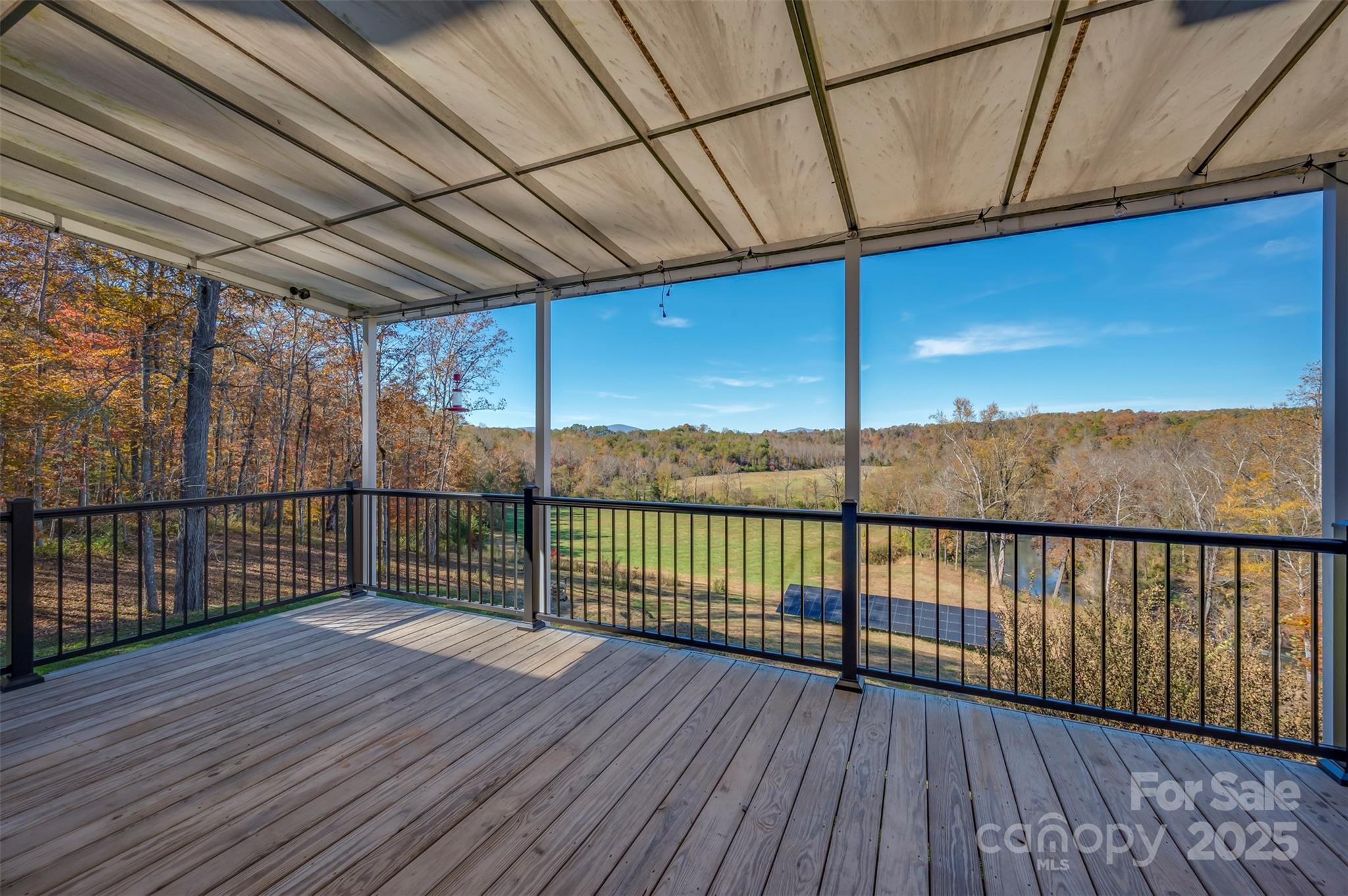 10105 Highway 108 Mill Spring, NC 28756 - Photo 17 of 44 a view of balcony with wooden floor
