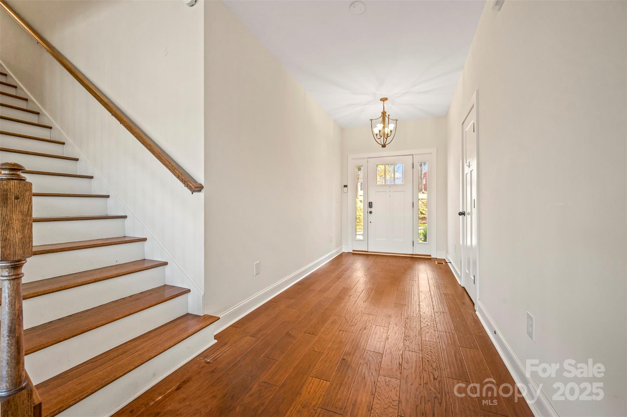 10105 Highway 108 Mill Spring, NC 28756 - Photo 18 of 44 a view of a room with wooden floor and staircase
