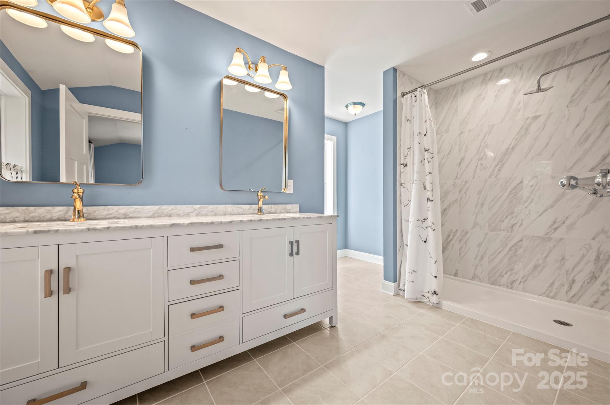 10105 Highway 108 Mill Spring, NC 28756 - Photo 21 of 44 a bathroom with a double vanity sink mirror and double