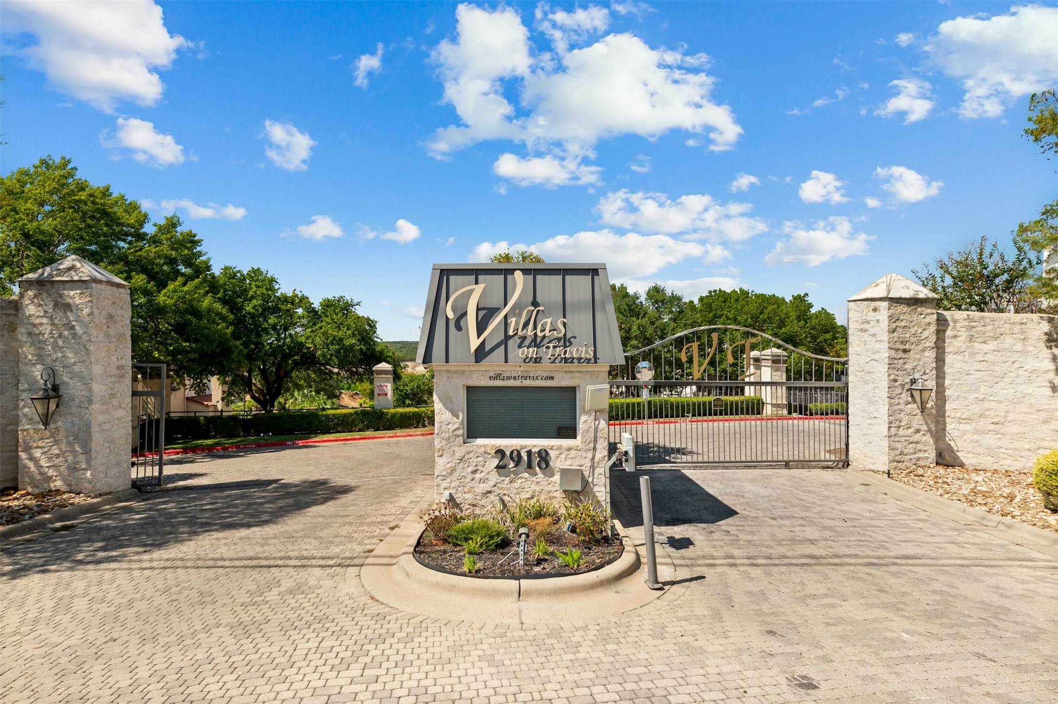 2918 Ranch To Market Road 620, Unit W219 Austin, TX 78734 - Photo 2 of 35 Welcome to Villas on Travis - a secure, gated community offering privacy and peace of mind with beautiful hill country surroundings.