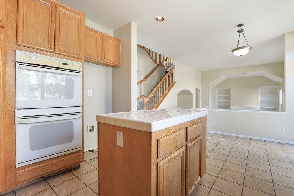 4695 Ellington Street Ventura, CA 93003 - Photo 15 of 43 a kitchen with a stove and a sink