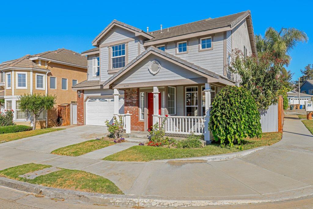 4695 Ellington Street Ventura, CA 93003 - Photo 2 of 43 a front view of a house with garden