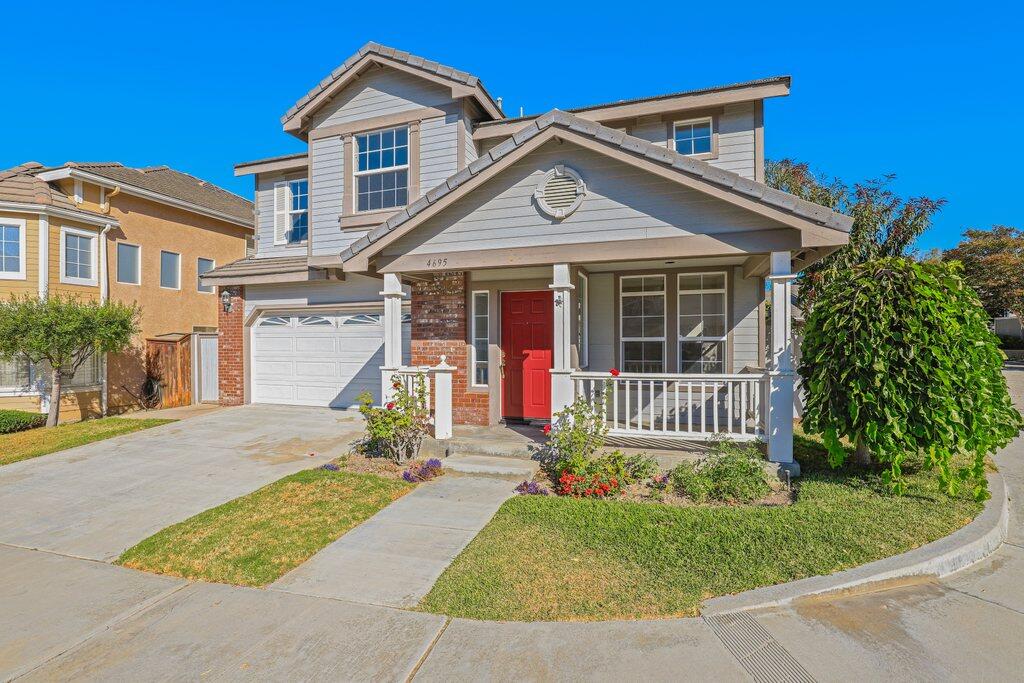 4695 Ellington Street Ventura, CA 93003 - Photo 3 of 43 front view of a house with a yard