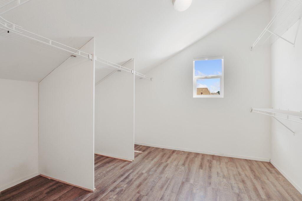 4695 Ellington Street Ventura, CA 93003 - Photo 32 of 43 a view of an empty room with wooden floor