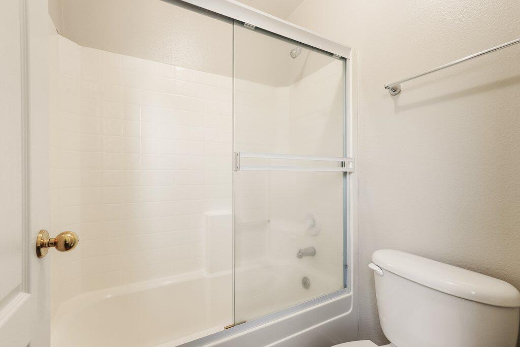 4695 Ellington Street Ventura, CA 93003 - Photo 39 of 43 a bathroom with a shower and a toilet