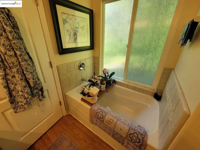 a bathroom with a sink mirror vanity and toilet
