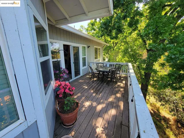 a workspace with furniture and chandelier