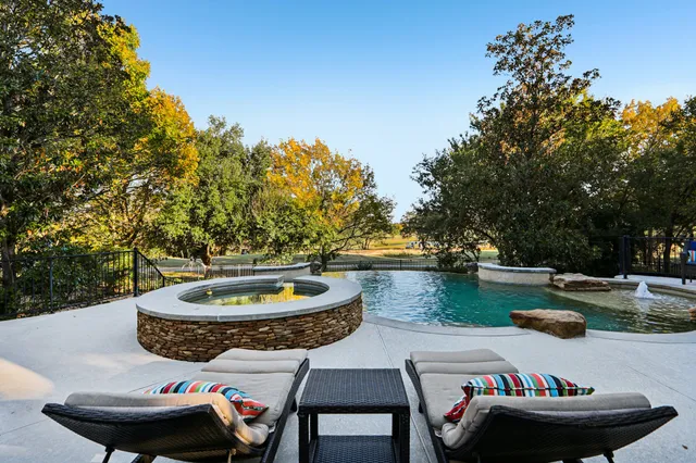 a table and chairs in a patio