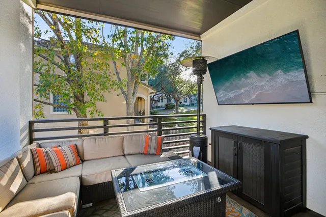 a view of a living room and furniture