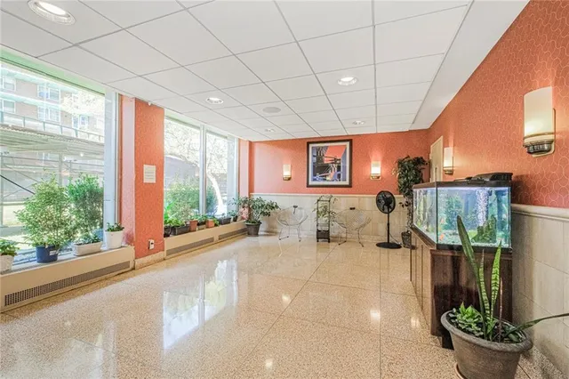 a view of a hallway with washer and dryer