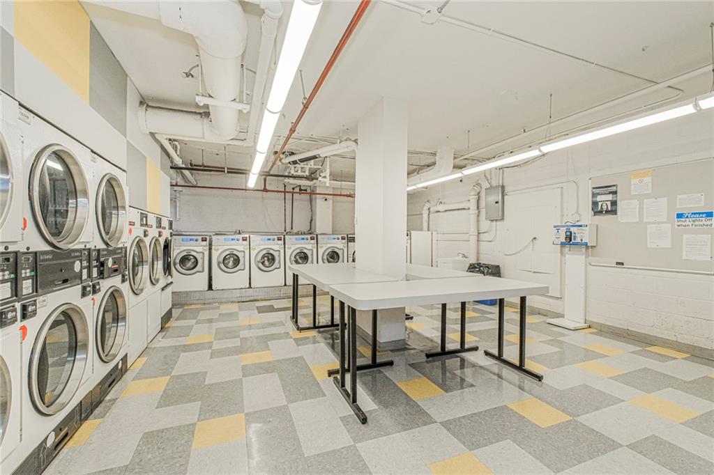 2630 Cropsey Avenue, Unit 9B Brooklyn, NY 11214 - Photo 29 of 29 a view of a hallway with washer and dryer