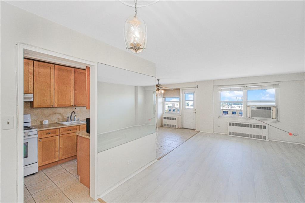 2630 Cropsey Avenue, Unit 9B Brooklyn, NY 11214 - Photo 5 of 29 a view of a kitchen with a sink and cabinets