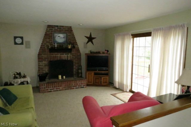 3859 Webb Road Ravenna, OH 44266 - Photo 8 of 22 family room with fireplace from the kitchen
