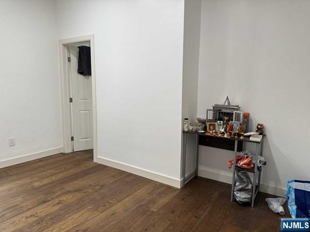 194 Washington Avenue, Unit 1 Rutherford, NJ 07070 - Photo 12 of 29 an empty room with wooden floor and closet