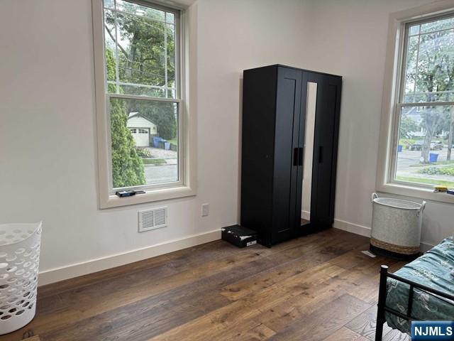 194 Washington Avenue, Unit 1 Rutherford, NJ 07070 - Photo 18 of 29 wooden floor and window in a room