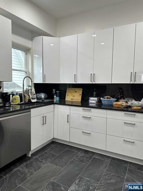 194 Washington Avenue, Unit 1 Rutherford, NJ 07070 - Photo 23 of 29 a view of kitchen with granite countertop white cabinets