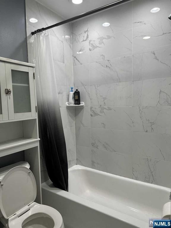 194 Washington Avenue, Unit 1 Rutherford, NJ 07070 - Photo 28 of 29 a bathroom with a toilet and a shower