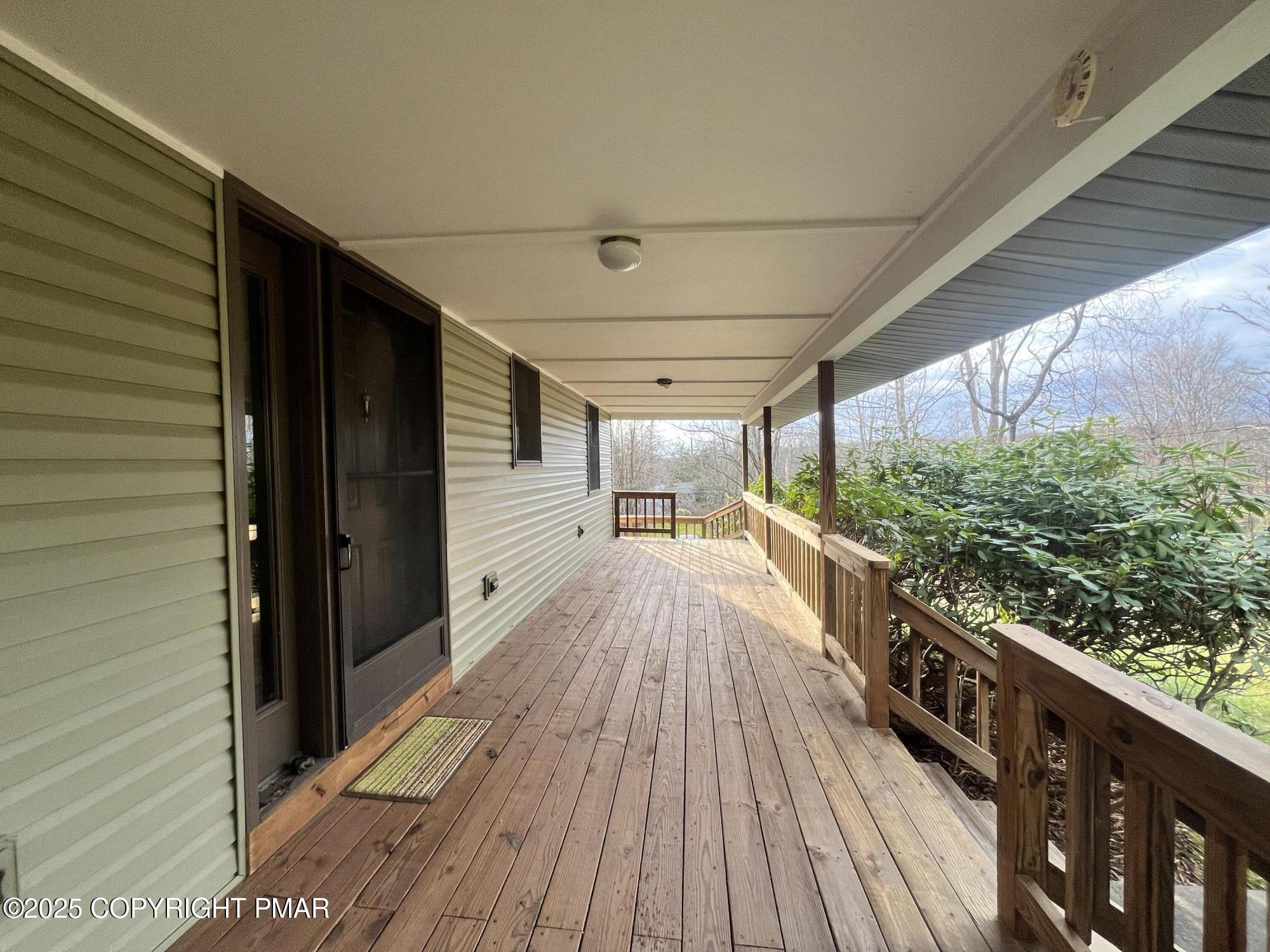 1970 Aberdeen Road Moscow, PA 18444 - Photo 12 of 45 a view of balcony with wooden floor