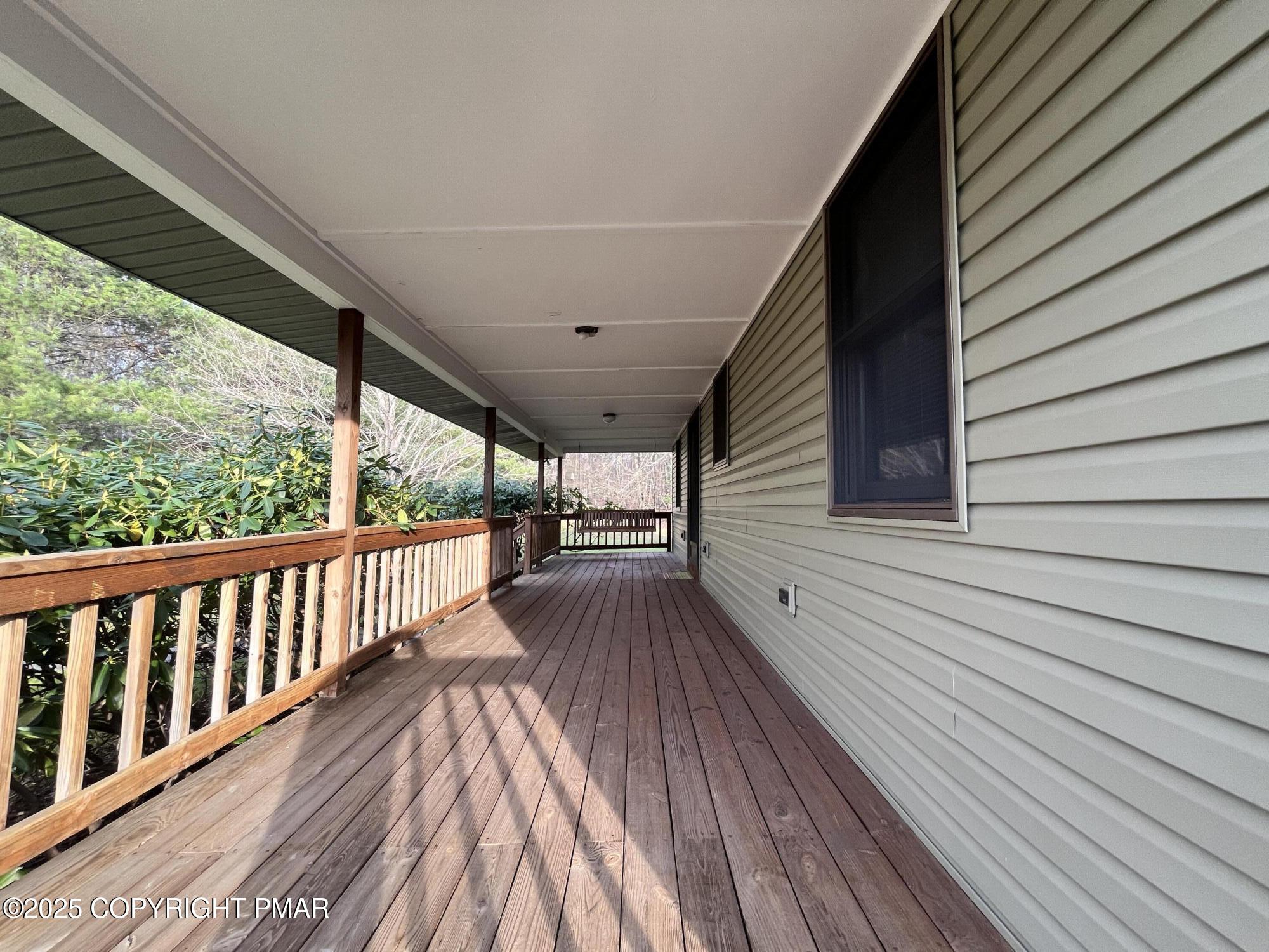 1970 Aberdeen Road Moscow, PA 18444 - Photo 14 of 45 a view of balcony with wooden floor