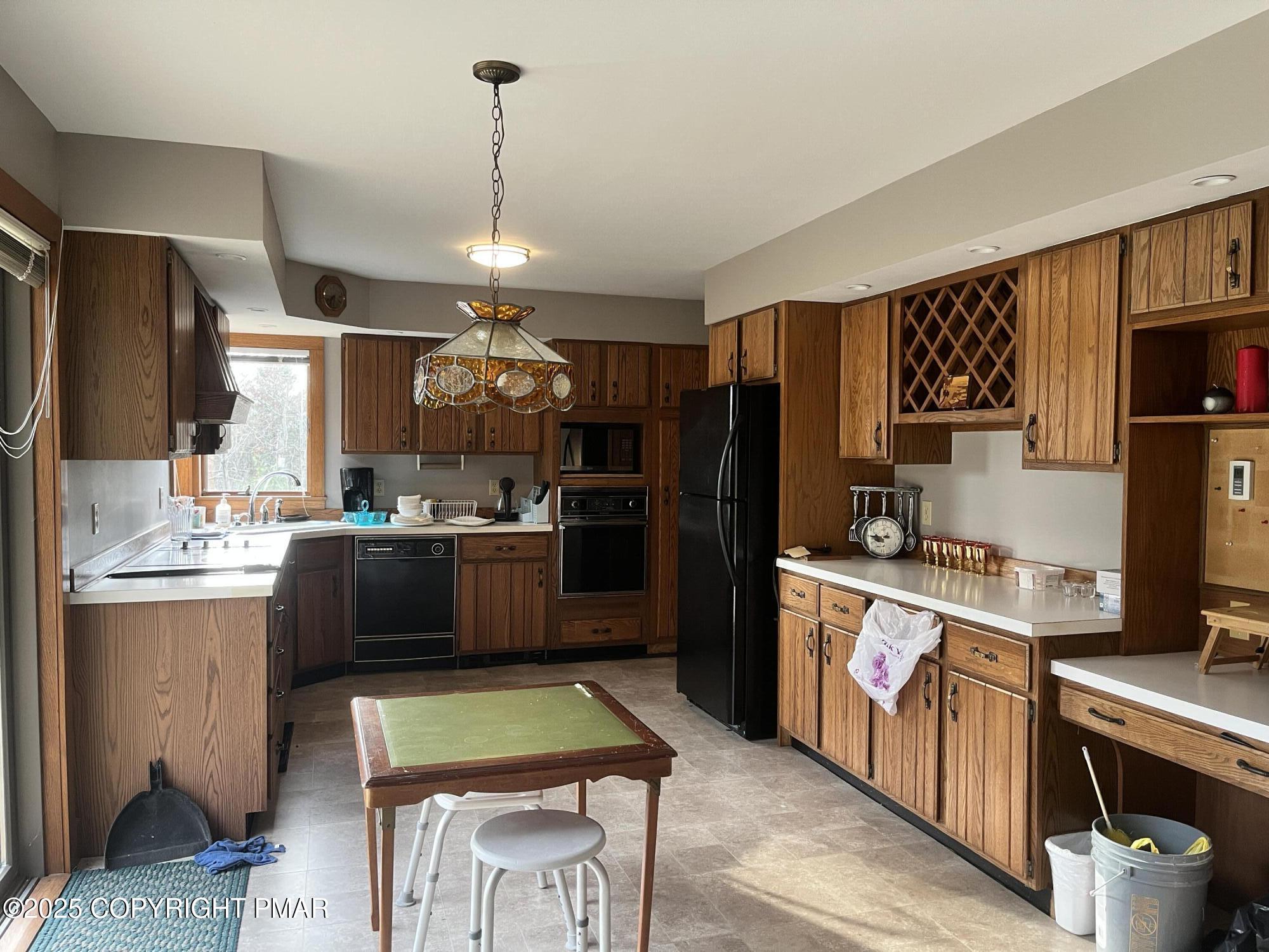 1970 Aberdeen Road Moscow, PA 18444 - Photo 18 of 44 a kitchen with stainless steel appliances granite countertop a refrigerator stove and sink
