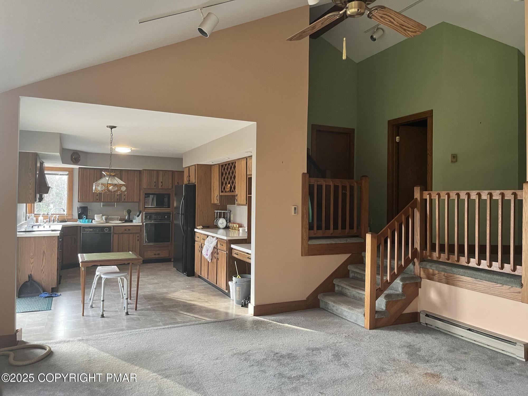 1970 Aberdeen Road Moscow, PA 18444 - Photo 18 of 45 a view of a livingroom with furniture and staircase