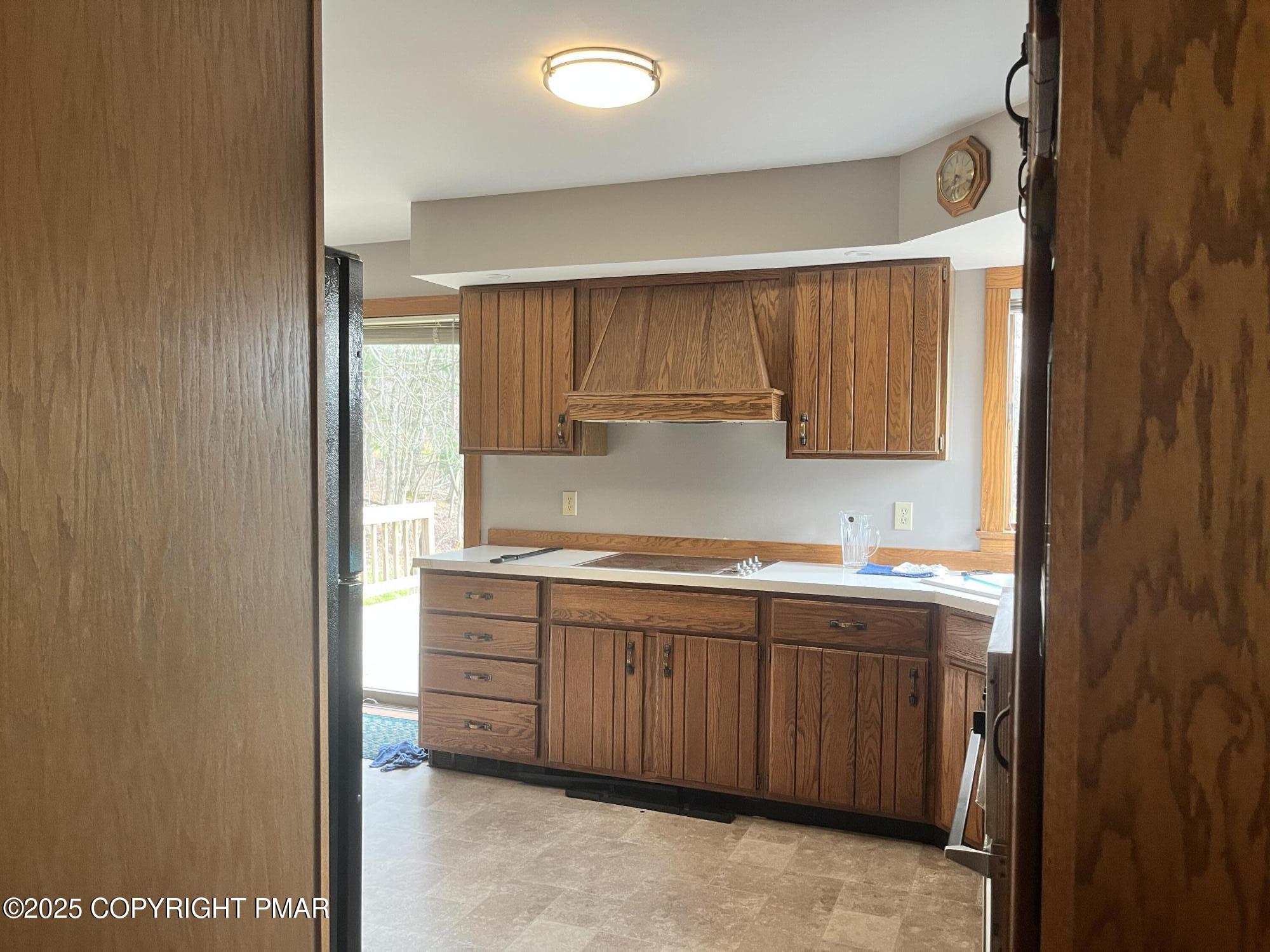 1970 Aberdeen Road Moscow, PA 18444 - Photo 20 of 45 a kitchen with a sink window and cabinets