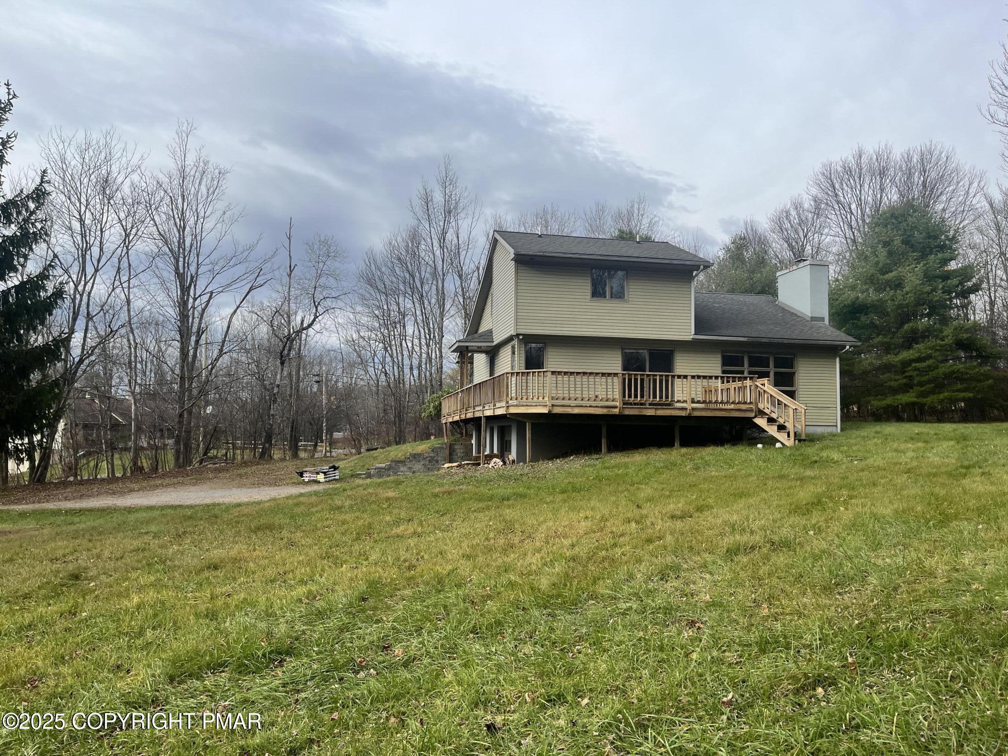 1970 Aberdeen Road Moscow, PA 18444 - Photo 2 of 45 a front view of house with yard and trees